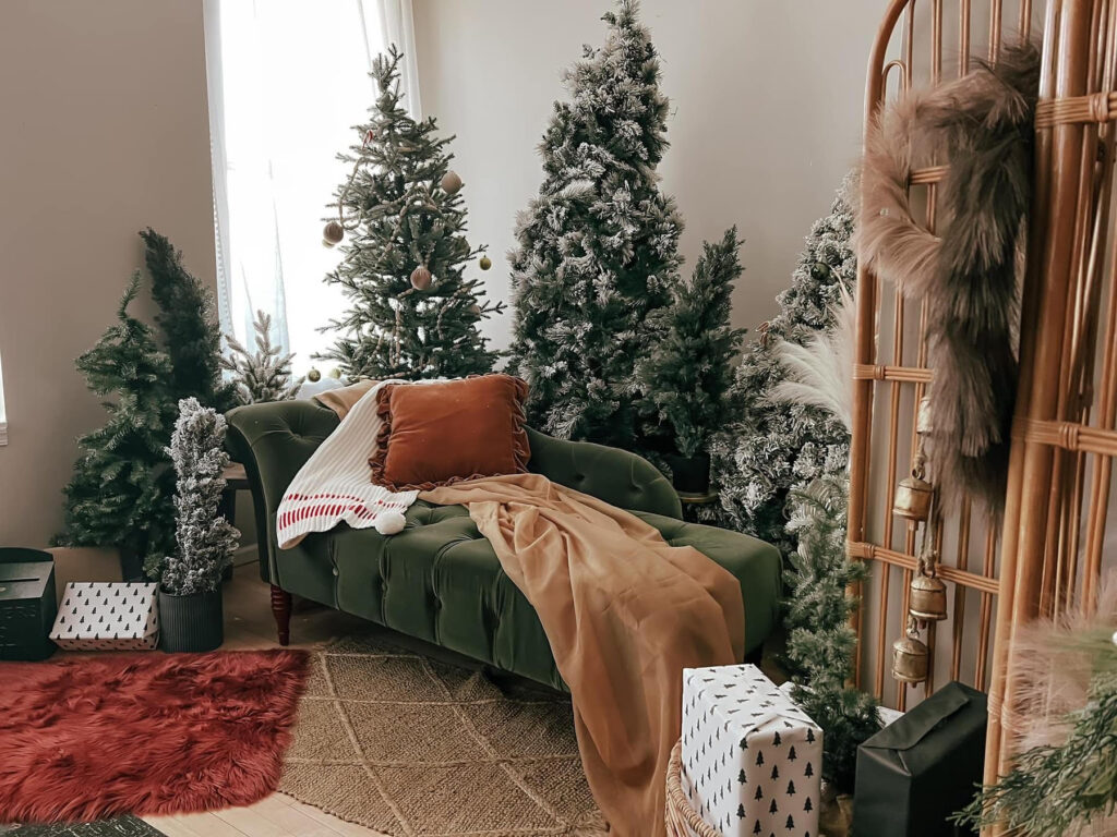 Cozy holiday living room with Christmas trees.
